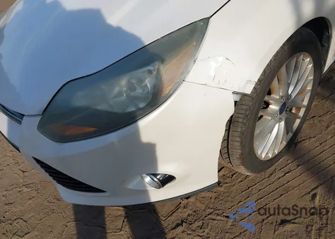 2014 Ford Focus Titanium из США, поврежденный, VIN 1FADP3J21EL367595